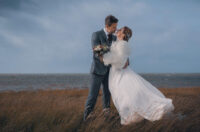 Beautiful wedding photography amidst the stunning landscapes of the wadden sea