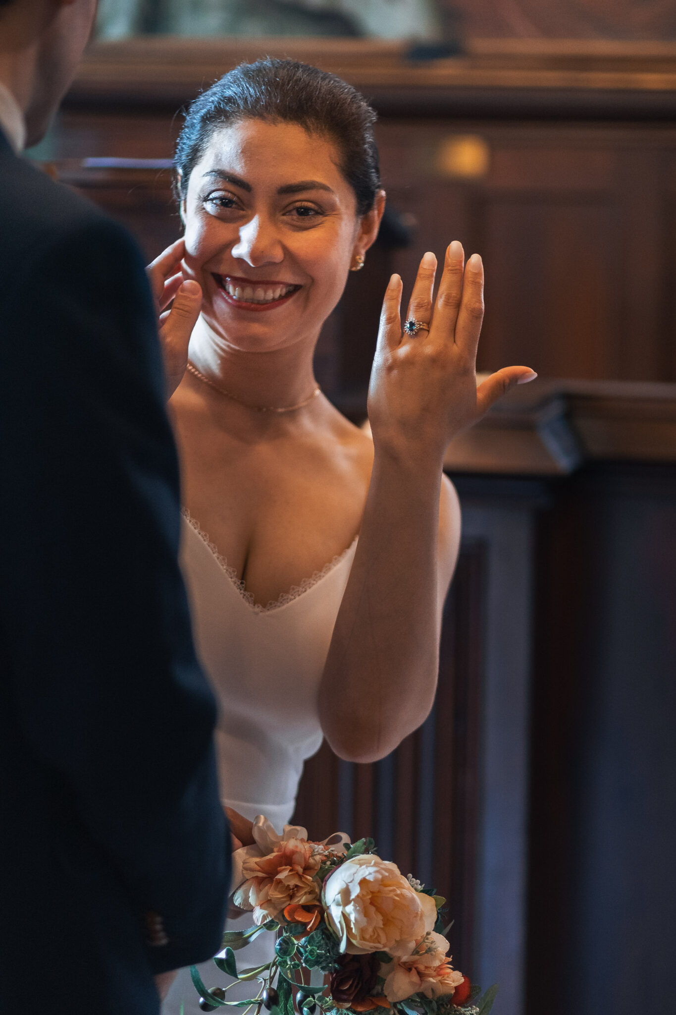 A professional wedding photographer capturing special moments in Ribe